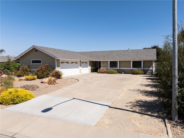 1269 Country Hill Rd, Santa Maria, CA 93455 - single story home with a garage, concrete driveway, and a shingled roof