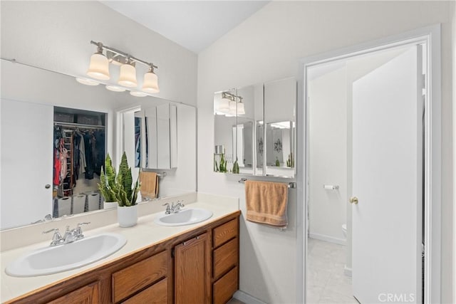1269 Country Hill Rd, Santa Maria, CA 93455 - bathroom featuring double vanity and a spacious closet