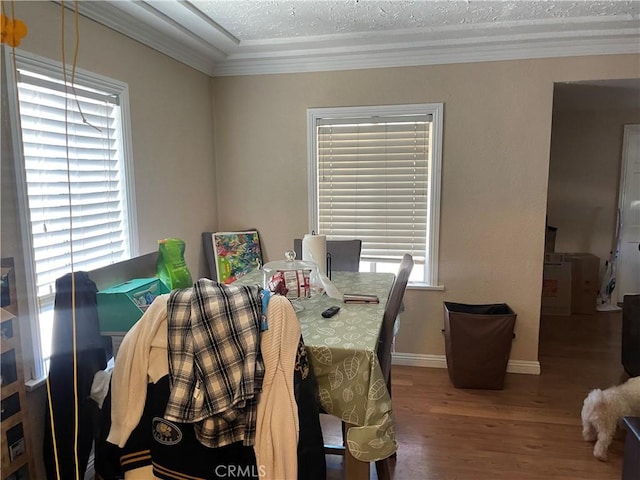 13213 Leffingwell Rd, Whittier, CA 90605 - dining space featuring wood finished floors, crown molding, and a textured ceiling