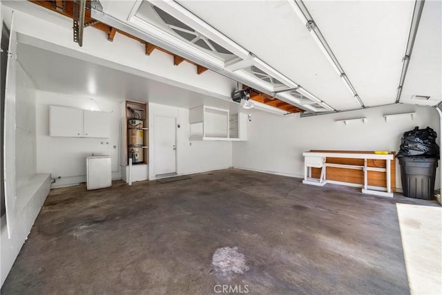 12277 Foster Rd, Norwalk, CA 90650 - garage featuring a garage door opener