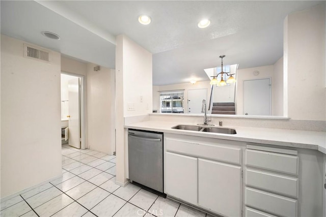 12277 Foster Rd, Norwalk, CA 90650 - kitchen featuring dishwasher, light countertops, white cabinetry, light tile patterned floors, and recessed lighting
