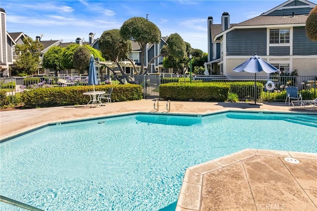 12277 Foster Rd, Norwalk, CA 90650 - community pool with a patio area
