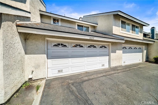 12277 Foster Rd, Norwalk, CA 90650 - garage with driveway