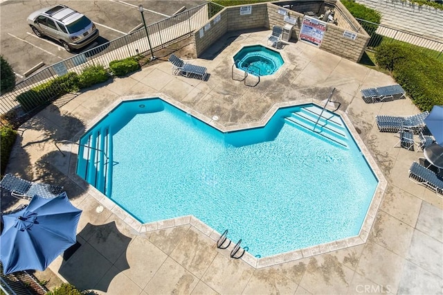 12277 Foster Rd, Norwalk, CA 90650 - community pool featuring a patio