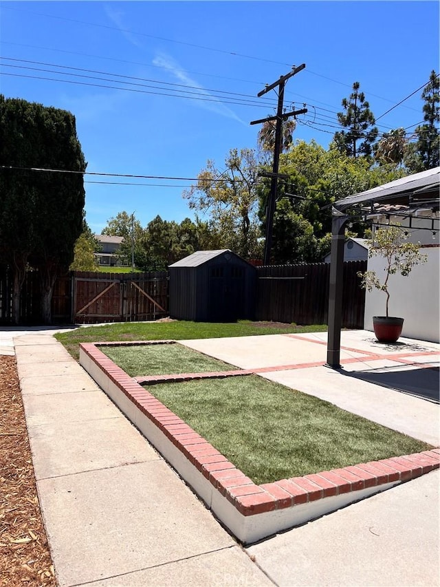 1610 266th St, Harbor City, CA 90710 - fenced backyard with a patio and a storage unit