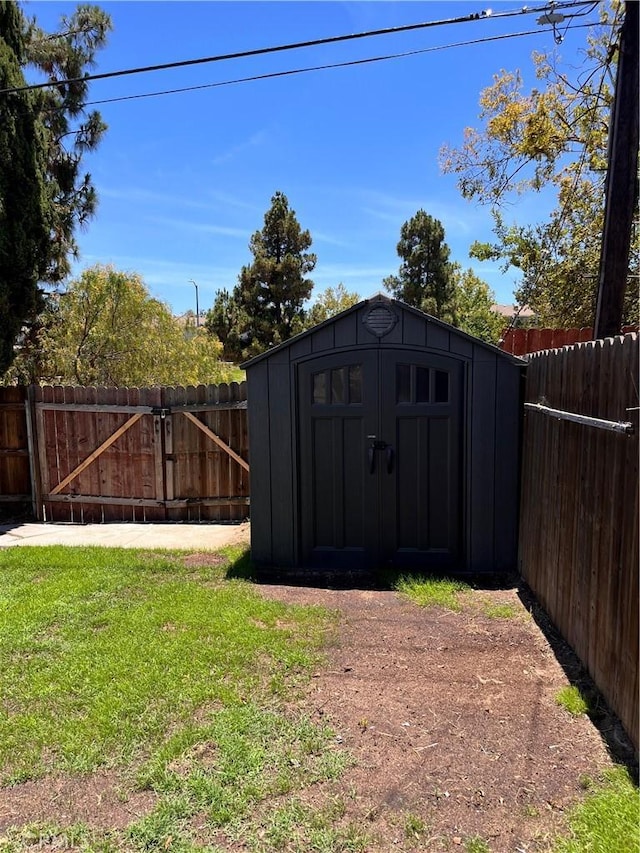 1610 266th St, Harbor City, CA 90710 - view of shed with a fenced backyard and a gate