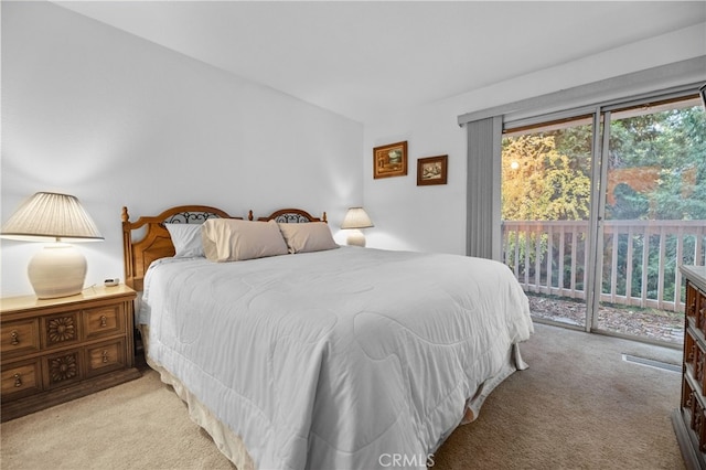 103 Rockledge Ln, Lake Arrowhead, CA 92352 - carpeted bedroom with access to exterior