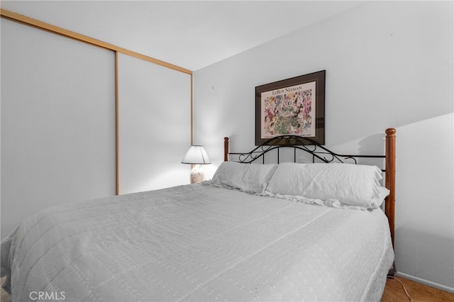 103 Rockledge Ln, Lake Arrowhead, CA 92352 - carpeted bedroom with baseboards and a closet