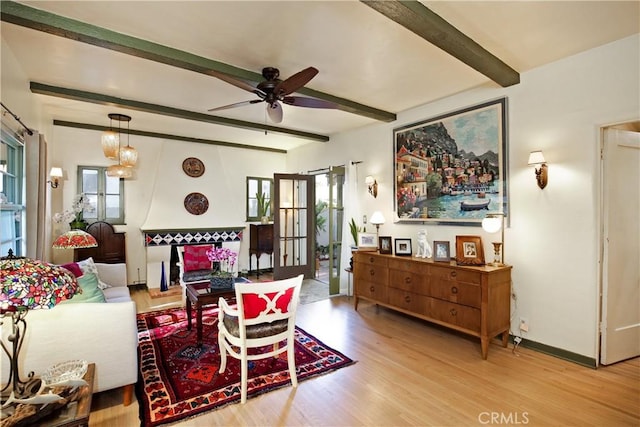 404 N Vinedo Ave, Pasadena, CA 91107 - living area featuring beamed ceiling, wood finished floors, ceiling fan, and plenty of natural light