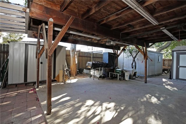404 N Vinedo Ave, Pasadena, CA 91107 - fenced backyard featuring a storage unit and a patio