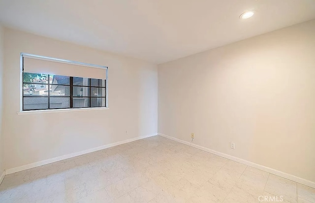2209 W 25th St Unit 7, San Pedro, CA 90732 - spare room featuring baseboards and recessed lighting