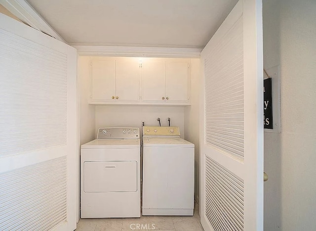 2209 W 25th St Unit 7, San Pedro, CA 90732 - washroom with cabinet space, washer and dryer, and light tile patterned floors