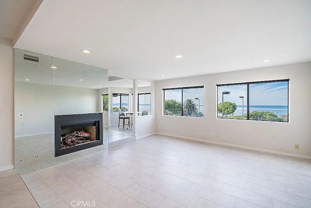 2209 W 25th St Unit 7, San Pedro, CA 90732 - unfurnished living room featuring recessed lighting, a fireplace, and light tile patterned floors