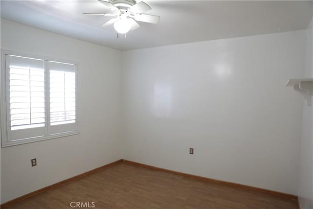 15154 Oliva Ave, Paramount, CA 90723 - empty room with wood finished floors and ceiling fan