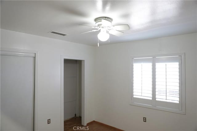 15154 Oliva Ave, Paramount, CA 90723 - unfurnished bedroom with ceiling fan and wood finished floors