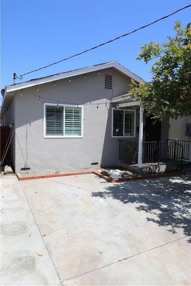 15154 Oliva Ave, Paramount, CA 90723 - back of property featuring stucco siding