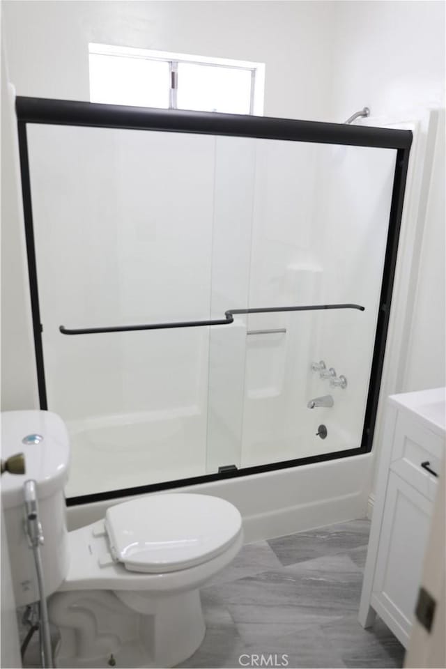 15154 Oliva Ave, Paramount, CA 90723 - bathroom with shower / bath combination with glass door and vanity