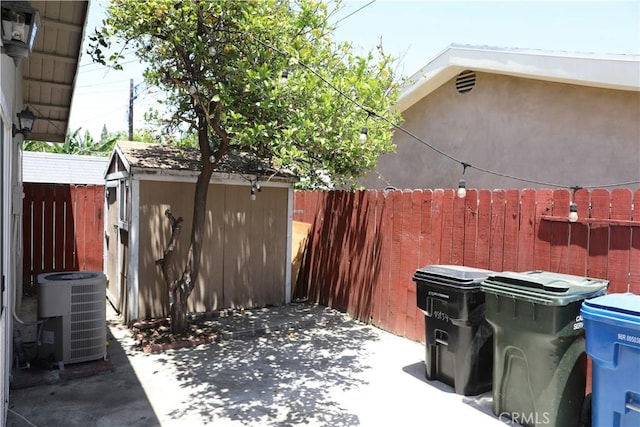 15154 Oliva Ave, Paramount, CA 90723 - view of patio / terrace featuring a storage unit