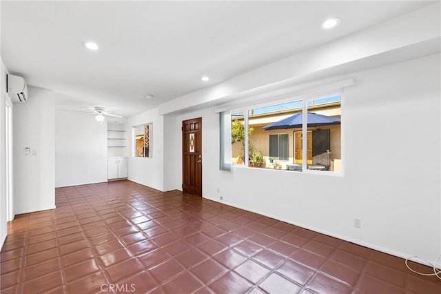 509561 S Highland Dr, Palm Springs, CA 92264 - unfurnished room with a wall mounted air conditioner, recessed lighting, and ceiling fan