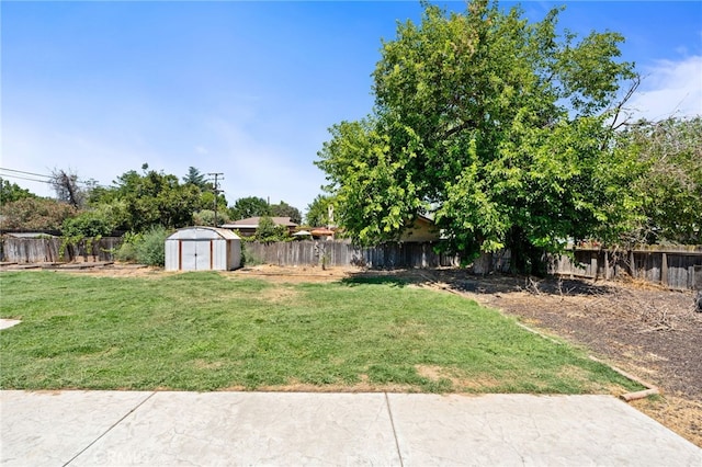 4491 N Dewitt Ave, Fresno, CA 93727 - fenced backyard featuring a storage unit