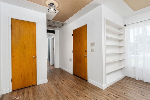 4491 N Dewitt Ave, Fresno, CA 93727 - empty room with wood finished floors and baseboards