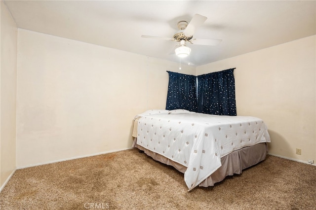 4491 N Dewitt Ave, Fresno, CA 93727 - carpeted bedroom featuring baseboards and a ceiling fan