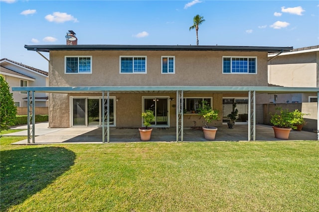 514 Mohawk Dr, Placentia, CA 92870 - rear view of house featuring stucco siding, a patio area, and a chimney
