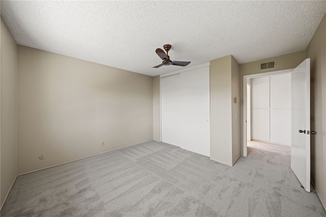 514 Mohawk Dr, Placentia, CA 92870 - unfurnished bedroom featuring light carpet, a closet, a textured ceiling, and ceiling fan