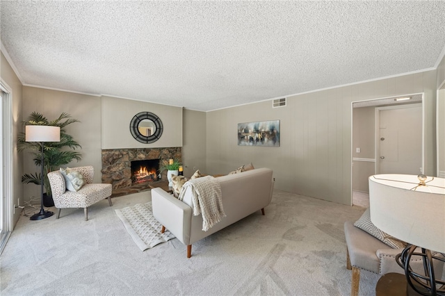 514 Mohawk Dr, Placentia, CA 92870 - living area featuring light colored carpet, crown molding, a stone fireplace, and a textured ceiling