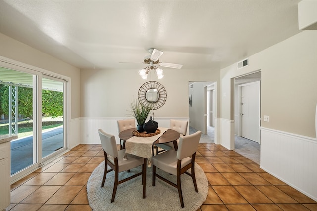 514 Mohawk Dr, Placentia, CA 92870 - dining space with wainscoting, light tile patterned floors, and ceiling fan