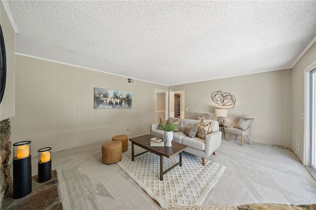 514 Mohawk Dr, Placentia, CA 92870 - carpeted living area featuring a textured ceiling and ornamental molding