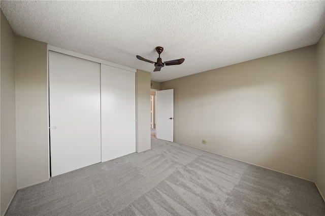 514 Mohawk Dr, Placentia, CA 92870 - unfurnished bedroom featuring a closet, light carpet, ceiling fan, and a textured ceiling