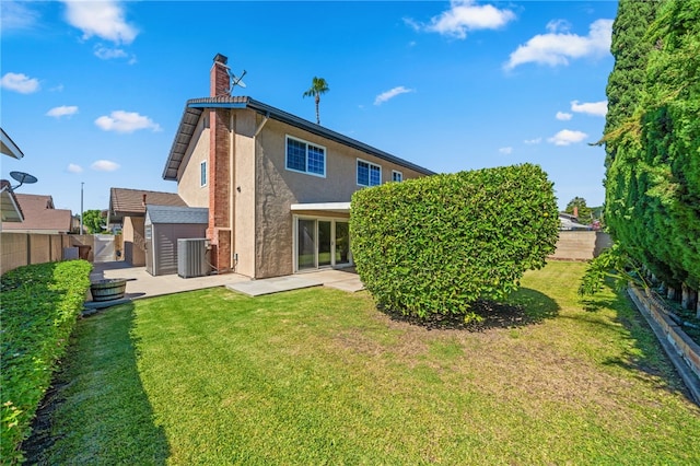 514 Mohawk Dr, Placentia, CA 92870 - back of house featuring stucco siding, a patio, a chimney, and a fenced backyard