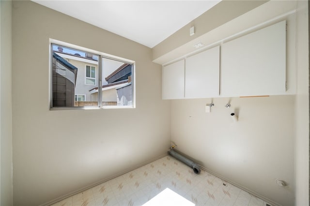 514 Mohawk Dr, Placentia, CA 92870 - laundry room with cabinet space, tile patterned floors, and hookup for a washing machine
