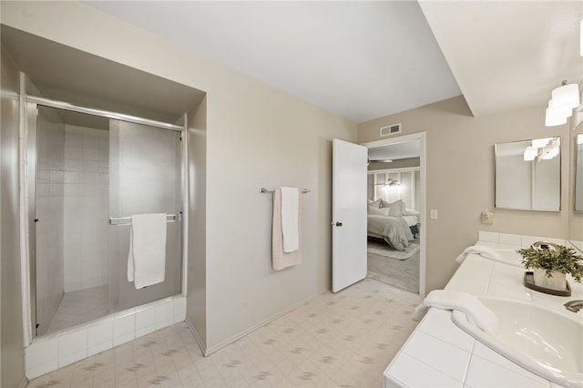 514 Mohawk Dr, Placentia, CA 92870 - full bathroom featuring a shower stall, connected bathroom, double vanity, and tile patterned floors