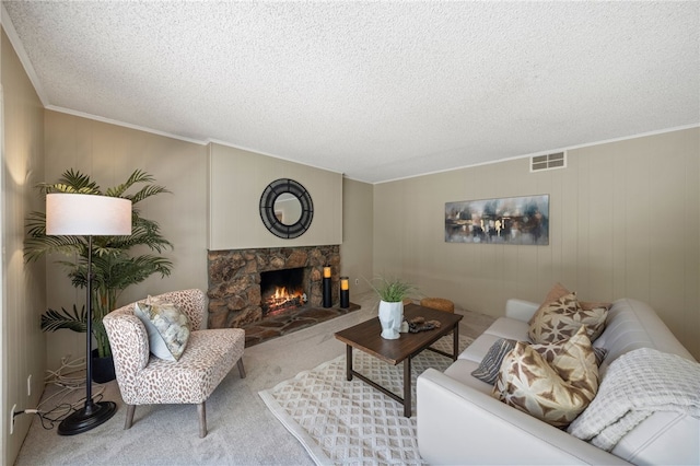 514 Mohawk Dr, Placentia, CA 92870 - carpeted living room with a textured ceiling, a stone fireplace, and ornamental molding