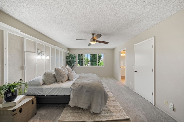 514 Mohawk Dr, Placentia, CA 92870 - bedroom featuring light carpet, connected bathroom, a ceiling fan, and a textured ceiling