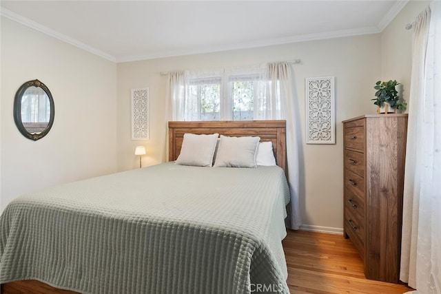 1414 W Jackman St, Lancaster, CA 93534 - bedroom with wood finished floors and ornamental molding