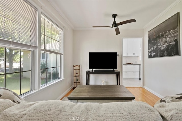 1414 W Jackman St, Lancaster, CA 93534 - bedroom with multiple windows, light wood-type flooring, ornamental molding, and a ceiling fan