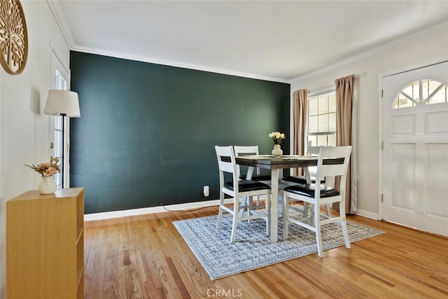 1414 W Jackman St, Lancaster, CA 93534 - dining space with wood finished floors and crown molding