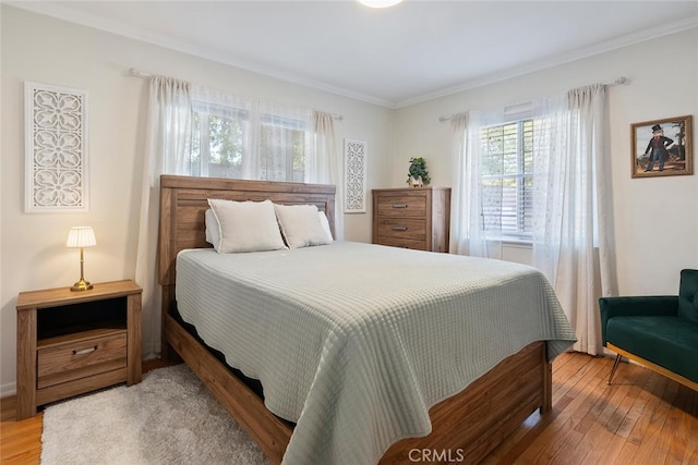 1414 W Jackman St, Lancaster, CA 93534 - bedroom featuring wood finished floors and crown molding