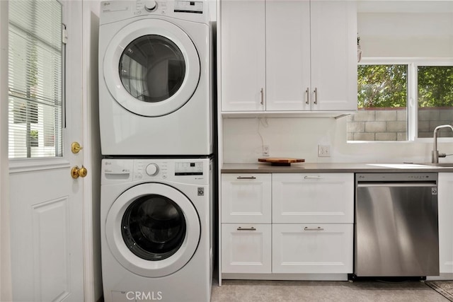 1414 W Jackman St, Lancaster, CA 93534 - washroom with stacked washer / drying machine and healthy amount of natural light