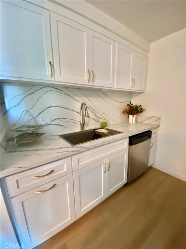 1640 Neil Armstrong St Unit 306, Montebello, CA 90640 - bar area with dishwasher, tasteful backsplash, and light wood-type flooring