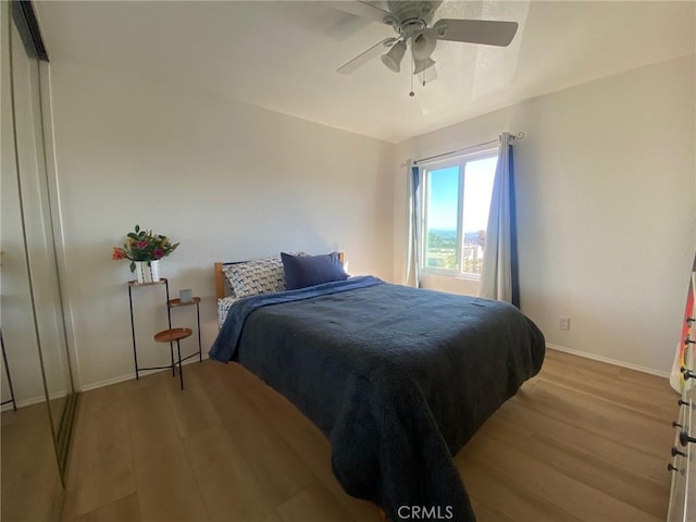 1640 Neil Armstrong St Unit 306, Montebello, CA 90640 - bedroom featuring light wood-style floors and a ceiling fan