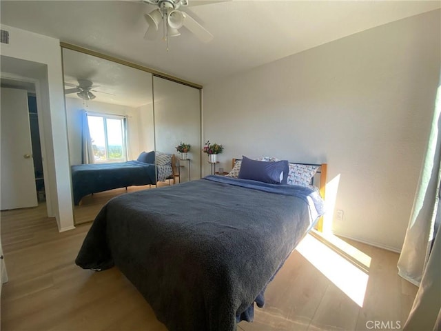 1640 Neil Armstrong St Unit 306, Montebello, CA 90640 - bedroom with light wood-type flooring, a closet, and ceiling fan