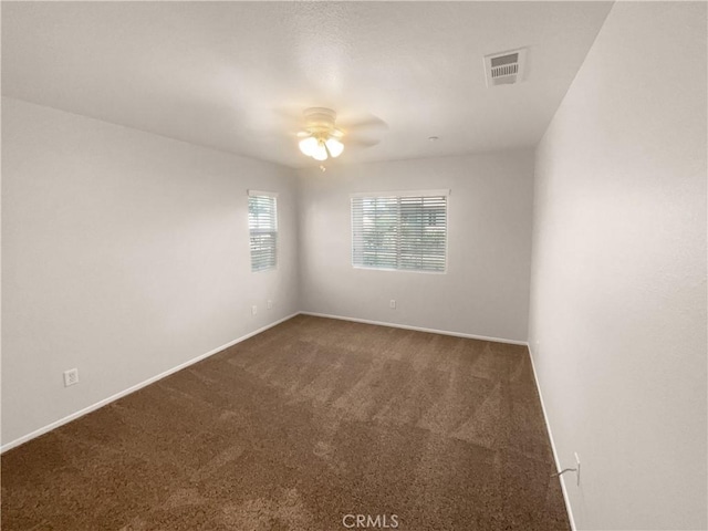 15617 Lasselle St Unit 31, Moreno Valley, CA 92551 - carpeted empty room featuring a ceiling fan and baseboards