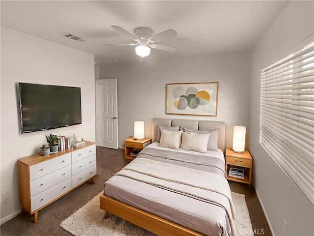 15617 Lasselle St Unit 31, Moreno Valley, CA 92551 - bedroom featuring dark colored carpet and ceiling fan