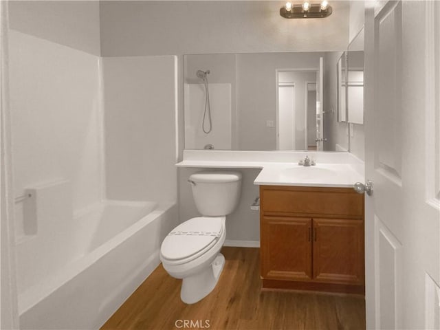 15617 Lasselle St Unit 31, Moreno Valley, CA 92551 - bathroom featuring wood finished floors, vanity, and shower / tub combination