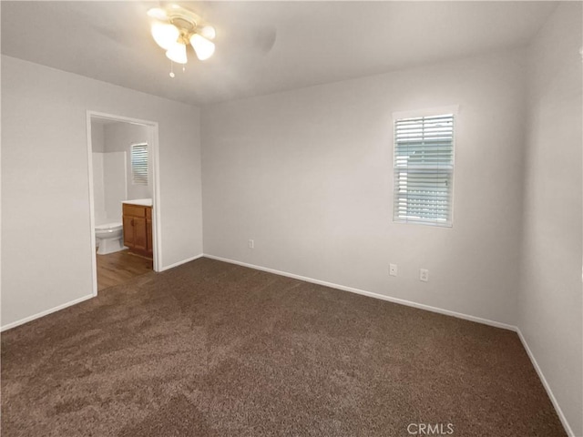 15617 Lasselle St Unit 31, Moreno Valley, CA 92551 - unfurnished room featuring dark colored carpet and ceiling fan