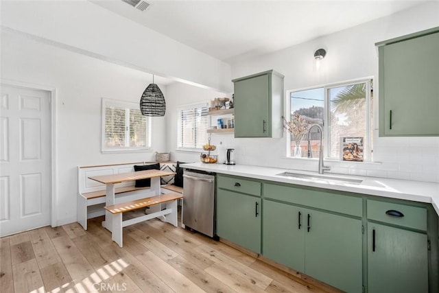 2082 Harris St, San Luis Obispo, CA 93401 - kitchen with dishwasher, green cabinetry, and light countertops